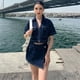 thumbnail image 3 of Conjunto de 2 piezas de moda para mujer, Top de mezclilla ajustado con cuello abatible corto y Falda vaquera asimétrica de cintura alta, 2024, 3 of 5