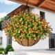 thumbnail image 4 of Cesta colgante de flores artificiales – Eucalipto simulado, camelia, palmera para decoración de interiores y exteriores, cesta de plantas artificiales sin mantenimiento para el hogar, jardín, 4 of 6
