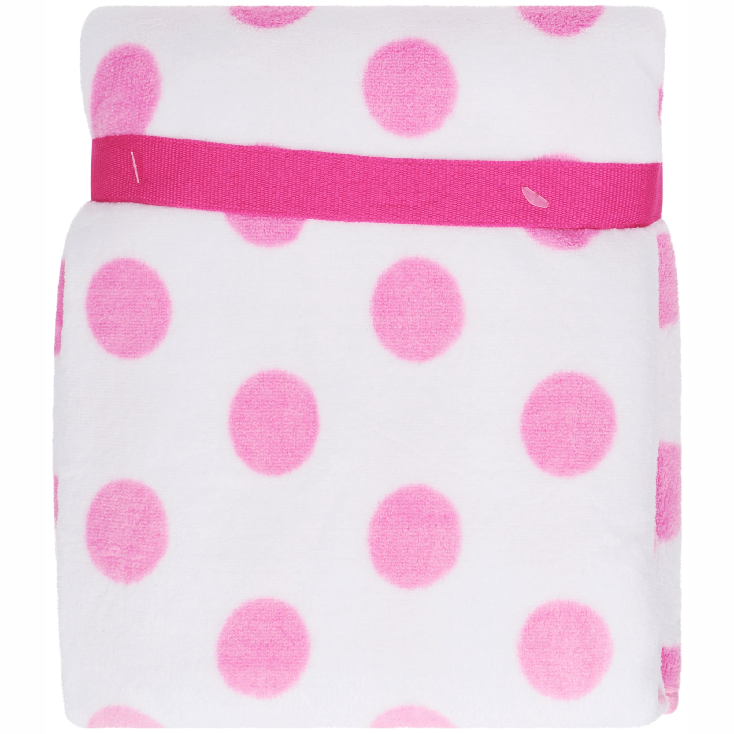 pink blanket with white polka dots