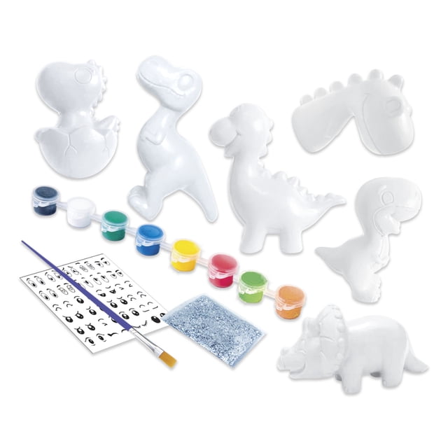 fábrica de skuishisaurios para decorar mi alegría set para crear y pintar skuishis Brillan en la oscuridad: vista cenital con seis moldes blancos de criaturas galácticas y dinosaurios sin pintar, ocho potes de pintura, pincel azul, bolsa de brillantina plateada y hoja de adhesivos con ojos; ideal para manualidades infantiles y como actividad para fiestas creativas.