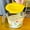 Yellow, variant on Large-capacity microwave-safe measuring cup with graduations - Borosilicate glass, microwave, oven, and dishwasher safe - BPA-free and heat-shock resistant - Elegant floral pattern, pink background,