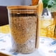 thumbnail image 4 of Recipientes de vidrio Povinmos 550 ml con tapa de bambú y cuchara, 4 of 9