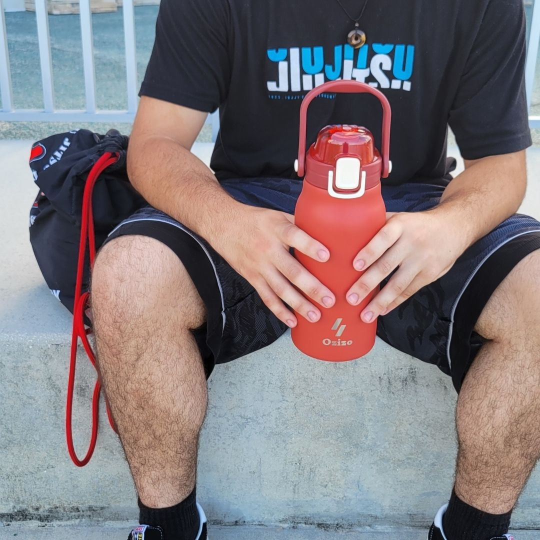 2 Ozizo 44oz Insulated Reusable Thermos Bottle with Straw, Mixing Ball, Push-Button Lid, and Handle