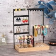 thumbnail image 1 of Organizador de pie, 4 niveles para pendientes con 48 agujeros, 6 ganchos para colgar collares, bandeja organizadora de anillos de 6 filas con soporte de pulsera de madera para reloj de mujer perfume (, 1 of 3