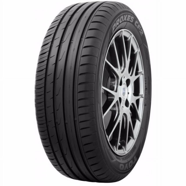 llanta 185/55 r14 toyo tires proxes cf2 80h 3/4 frontal montada en rin 14, banda de rodamiento asimétrica con cuatro canales longitudinales y surcos laterales, flanco con inscripción 'PROXES CF2' y marca Toyo sobre fondo blanco; apta para carros compactos y deportivos compactos.