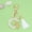 G G, variant on Giunmcul Holiday Saving New White Tassel Letter Key Chain Crystal Drop Pendant Fashionable Bag Key Chain