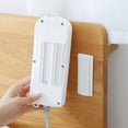 thumbnail image 1 of Soporte para regleta de alimentación de montaje en pared Adhesivo sin costuras Autoadhesivo Rack de enchufe para el hogar, 1 of 5