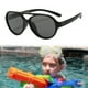 thumbnail image 4 of Gafas de sol redondas para fiestas de moda para niños de 3 a 8 años. Negro, 4 of 5