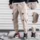 thumbnail image 4 of Pantalones cargo casuales para hombre con cintura elástica, cordón ajustable, bolsillo con solapa y letras estampadas, 4 of 7