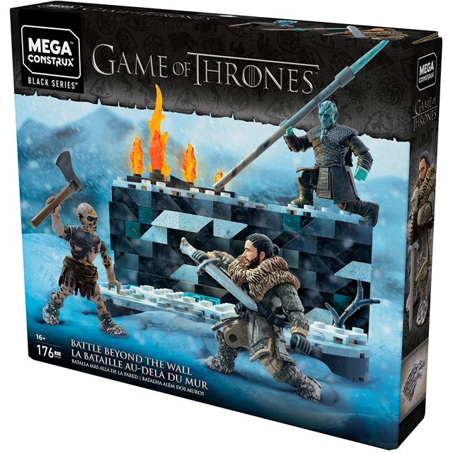 mega construx juego de tronos, caminante blanco, batalla del trono de hierro, batalla de shifall, set de juguetes para niños — caja 3/4 frontal que muestra un set de 176 piezas con un muro helado gris-azul, dos figuras humanas con capa y piel y un caminante blanco elevado con lanza; fondo nevado y llamas impresas en la parte superior del muro. Su tamaño compacto lo hace adecuado para exhibición en estantes de juguetes.