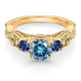 thumbnail image 2 of Gem Stone King 18K Yellow Gold Plated Silver Persian Blue Moissanite Blue Created Sapphire and White Moissanite Engagement Ring for Women (1.35 Cttw, Gemstone, Round 6MM and 3MM, Size 5), 2 of 4