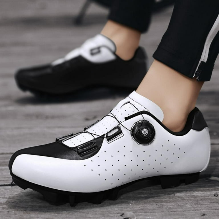 Ladies spinning on sale shoes with cleats