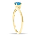thumbnail image 2 of SZUL Women's Round Shaped Solitaire Blue Topaz Wave Ring in 10K Yellow Gold, 2 of 5