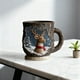thumbnail image 5 of Taza de cerámica craquelada con diseño de bosque mágico navideño | Apta para microondas y lavavajillas | Acabado craquelado único | Taza de gran capacidad para chocolate caliente, café y té | Regalo, 5 of 6