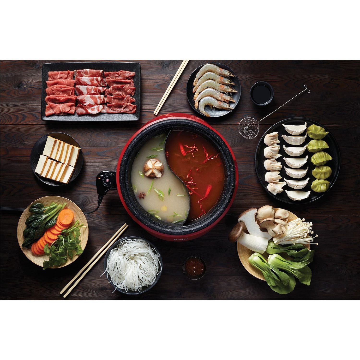 Starfrit The Rock Dual-Sided Electric Hot Pot, 3L, Rock.Tec Non-Stick, Variable Temperature Control, 1200W, Enjoy two broths at once with the Starfrit The Rock Dual-Sided Electric Hot Pot. Featuring Rock.Tec non-stick surface, 3L capacity, adjustable heat, and cool-touch base. Die-cast aluminum pot with even heating for perfect meals every time.