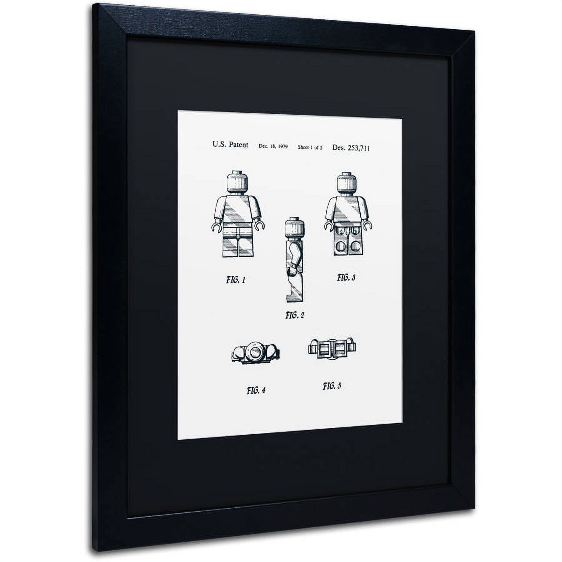 Trademark Fine Art "Lego Man Patent 1979 Page 1 White" Canvas Art by Claire Doherty, Black Matte, Black Frame