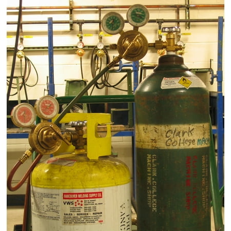 Oxygen Gas Cylinder Cabinet - Canvas Print Oxygen and MAPP gas compresed gas cylinders with regulators. The high pressure side of the oxygen re Stretched Canvas 10 x 14