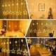 thumbnail image 3 of Luces de cortina de estrellas para dormitorio - Luces LED centelleantes de hadas enchufables de 9 pies con 12 estrellas, con control remoto 8 modos de iluminación, blanco cálido, 3 of 5
