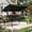 Black, variant on Resenkos Outdoor Gliding Seating for Backyard, Detachable Cushions Side Pockets 3-Person Patio Canopy Swing, Brown