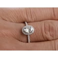 thumbnail image 4 of Oval Cut 1.25 ct Halo Moissanite and Diamond Engagement Ring in White Gold, 4 of 5