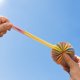 thumbnail image 5 of Juguete de pelota saltarina con volante de pompón de cuerda de goma colorida para niños, ligero, duradero, para jugar en interiores y exteriores, hecho a mano, de 6.5 pulgadas., 5 of 6