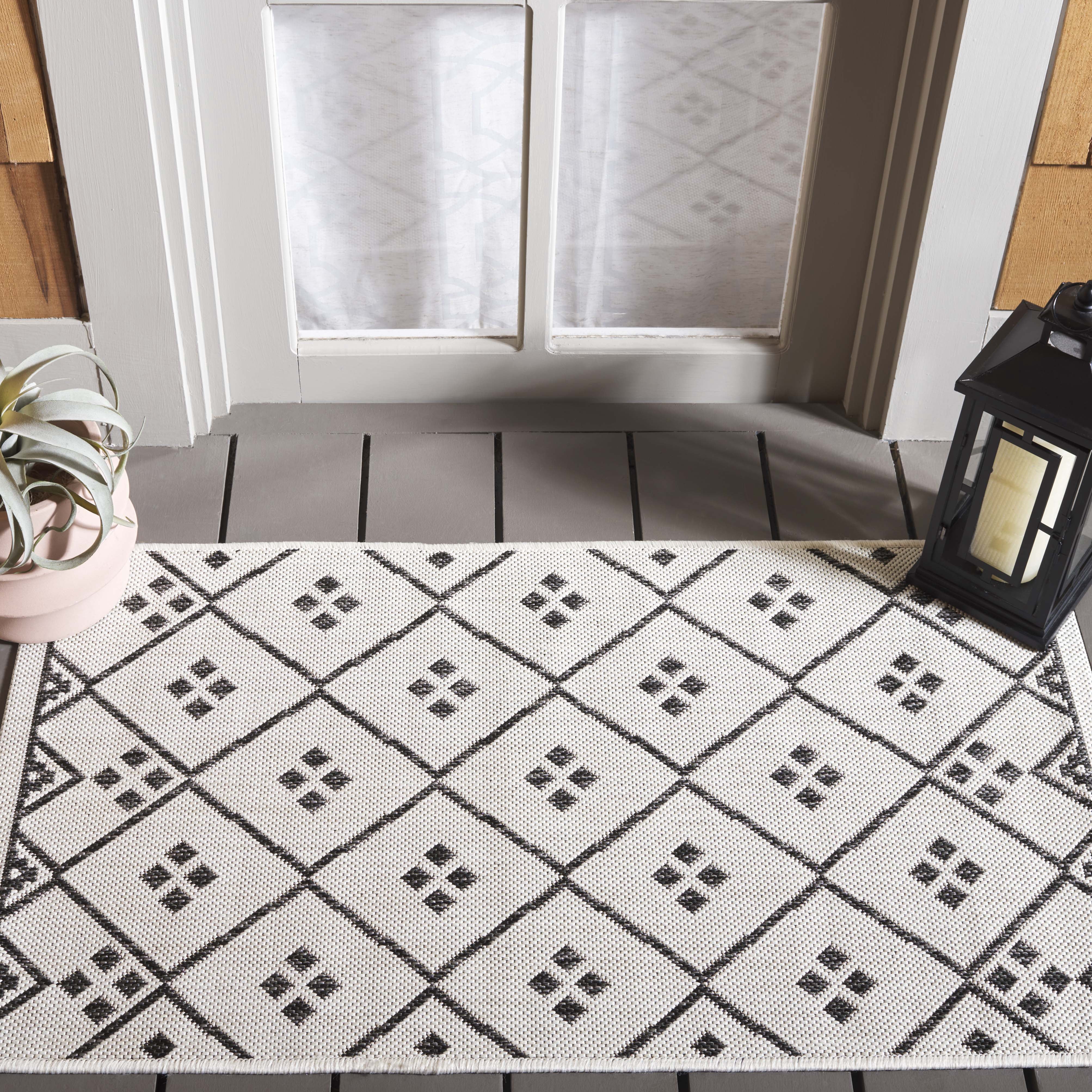 SAFAVIEH Courtyard Wasif Geometric Indoor/Outdoor Area Rug, Ivory/Black, 2' x 3'7"