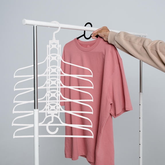 SILENRADAWN Foldable White Plastic Clothes Rack, Versatile Wardrobe Organizer for Bedroom, Laundry Room, and Home Storage Solutions