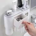 thumbnail image 1 of Escupidera de pared con ranuras para organizar peines y cepillos de dientes, 1 of 7