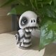 thumbnail image 4 of Estatua de caracol de calavera que sacude la cabeza, estatuilla de caracol, calavera de Animal de Halloween, Mini figuras de muñecos de esqueleto, tablero de coche de fiesta, 4 of 5