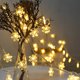 thumbnail image 1 of Luces de cadena de copo de nieve, LED Fairy Snow Lantern Lights decoración interior y exterior para año nuevo, Navidad, patio de césped(Color cálido)(3.20 metro y 20 luces), 1 of 5