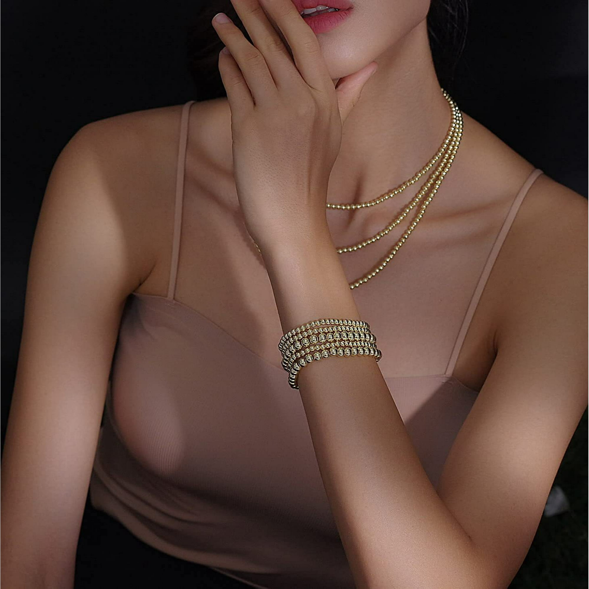 Gold ball bracelets deals
