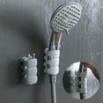 thumbnail image 1 of Soporte para la ducha con ventosa - base montada en la pared sin punzonar para el baño, con una adhesión fuerte extraíble, mantiene la pared seca y ordenada, 1 of 2