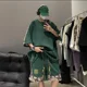 thumbnail image 3 of Conjunto de pantalones cortos para hombre, de algodón, estampado gráfico negro, básico, moderno, camiseta para hombre, conjuntos cortos, oferta de dos piezas, novedad 2025 en conjuntos estéticos, 3 of 4
