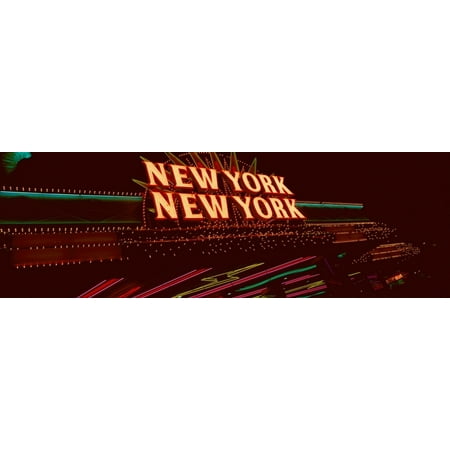 Panoramic view of New York New York hotel and casino and neon lights Las Vegas NV Poster Print