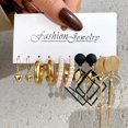 thumbnail image 1 of Conjunto de pendientes de resina de Metal negro de Color dorado a la moda para mujer, pendiente de gota de mariposa con corazón de perla y círculo geométrico Retro, joyería 2022 Tan Jianjun unisex, 1 of 2