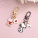 thumbnail image 4 of LLavero de Snoopy Anime para mujer y niña, accesorios colgantes de mochila, decoración de llavero Kawaii, regalo de joyería, 4 of 5