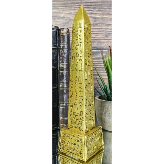Gods Of Egypt Temple of Ra Gold Colored Luxor Obelisk With Hieroglyphs Statue