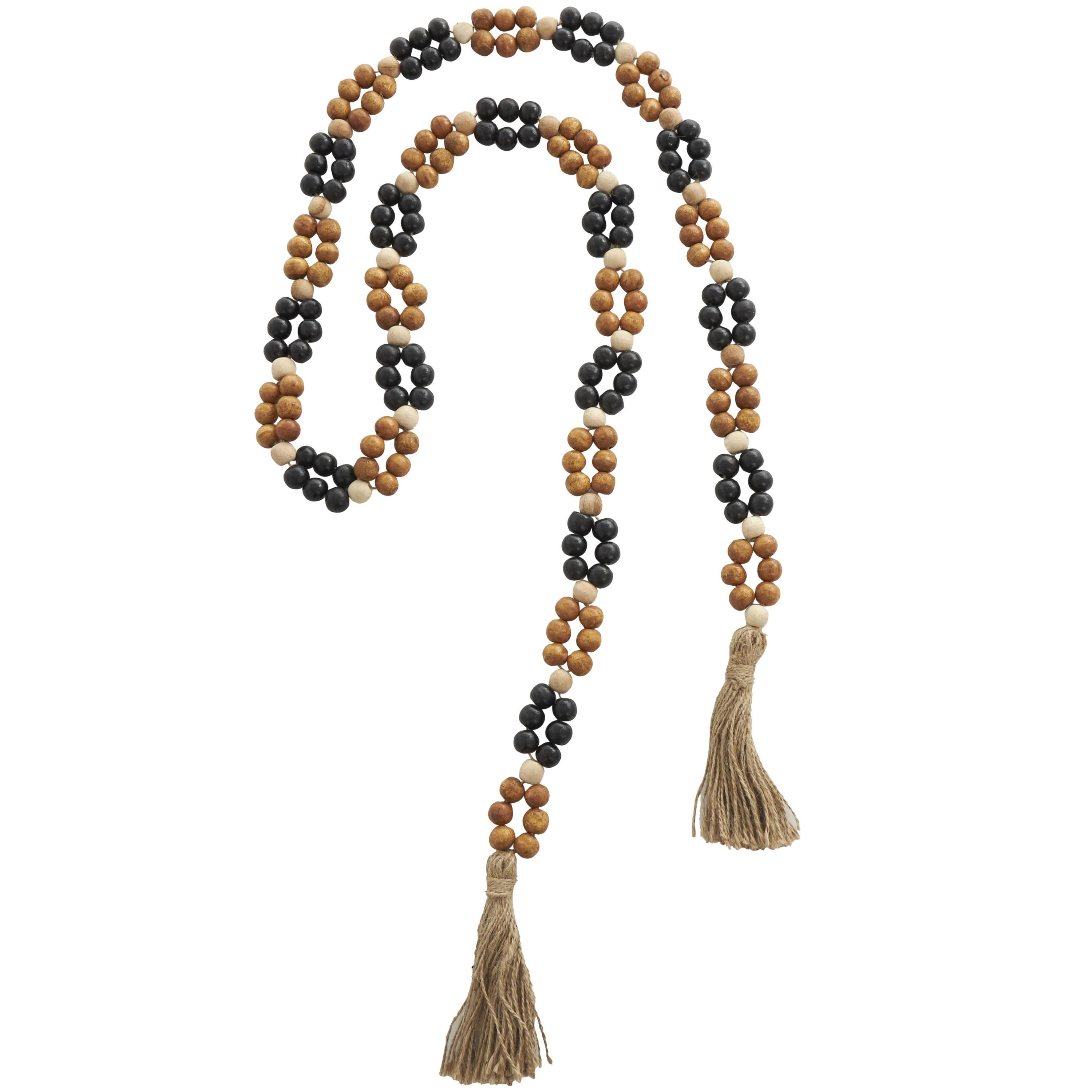 DecMode Handmade Round Double Layered Long Carved Brown Mango Wood Garland with Tassel with Black and Cream Accents
