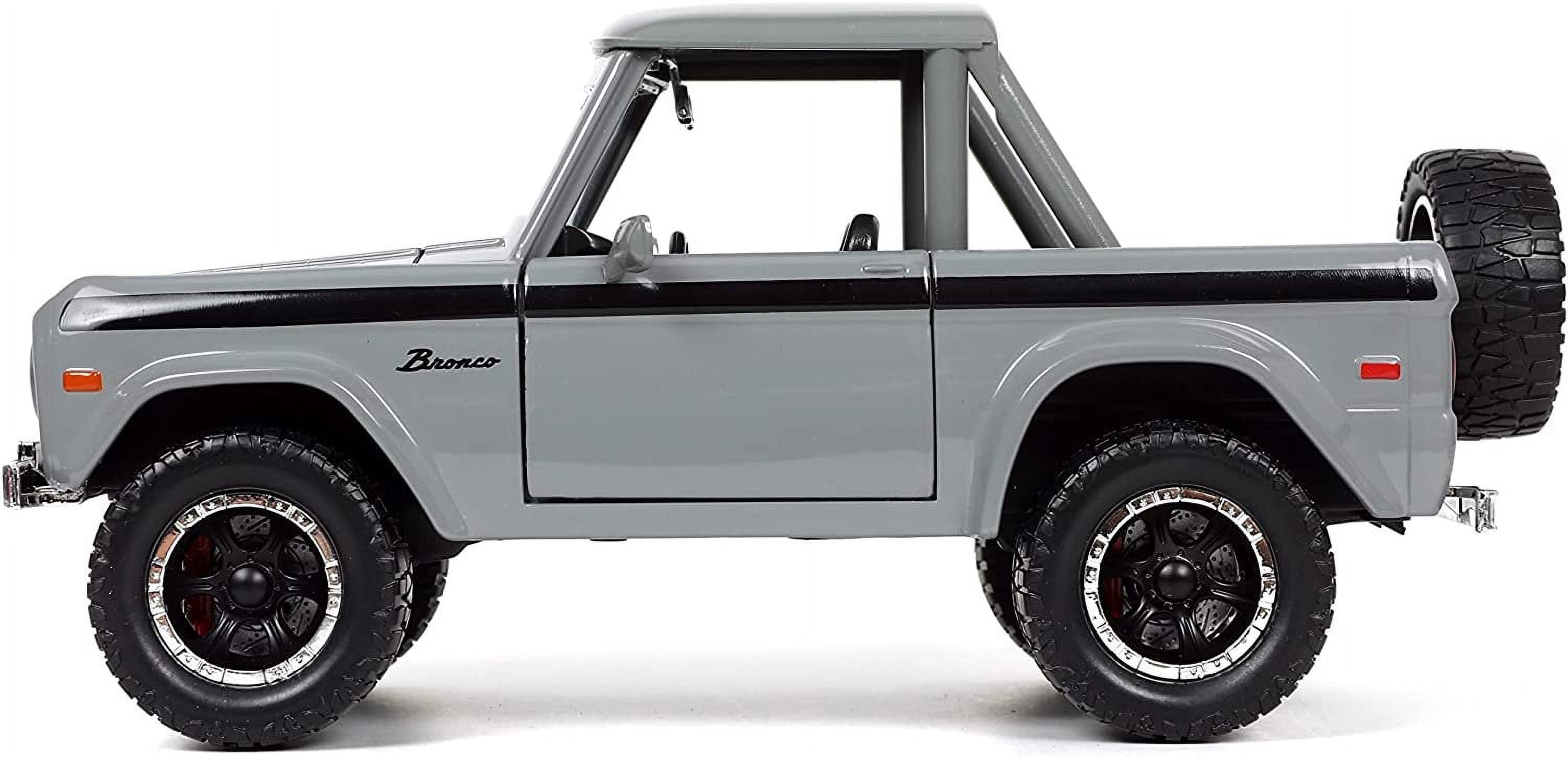 1973 Ford Bronco Pickup Truck Gray with Black Stripes with Extra Wheels "Just Trucks" Series 1/24 Diecast Model Car by Jada