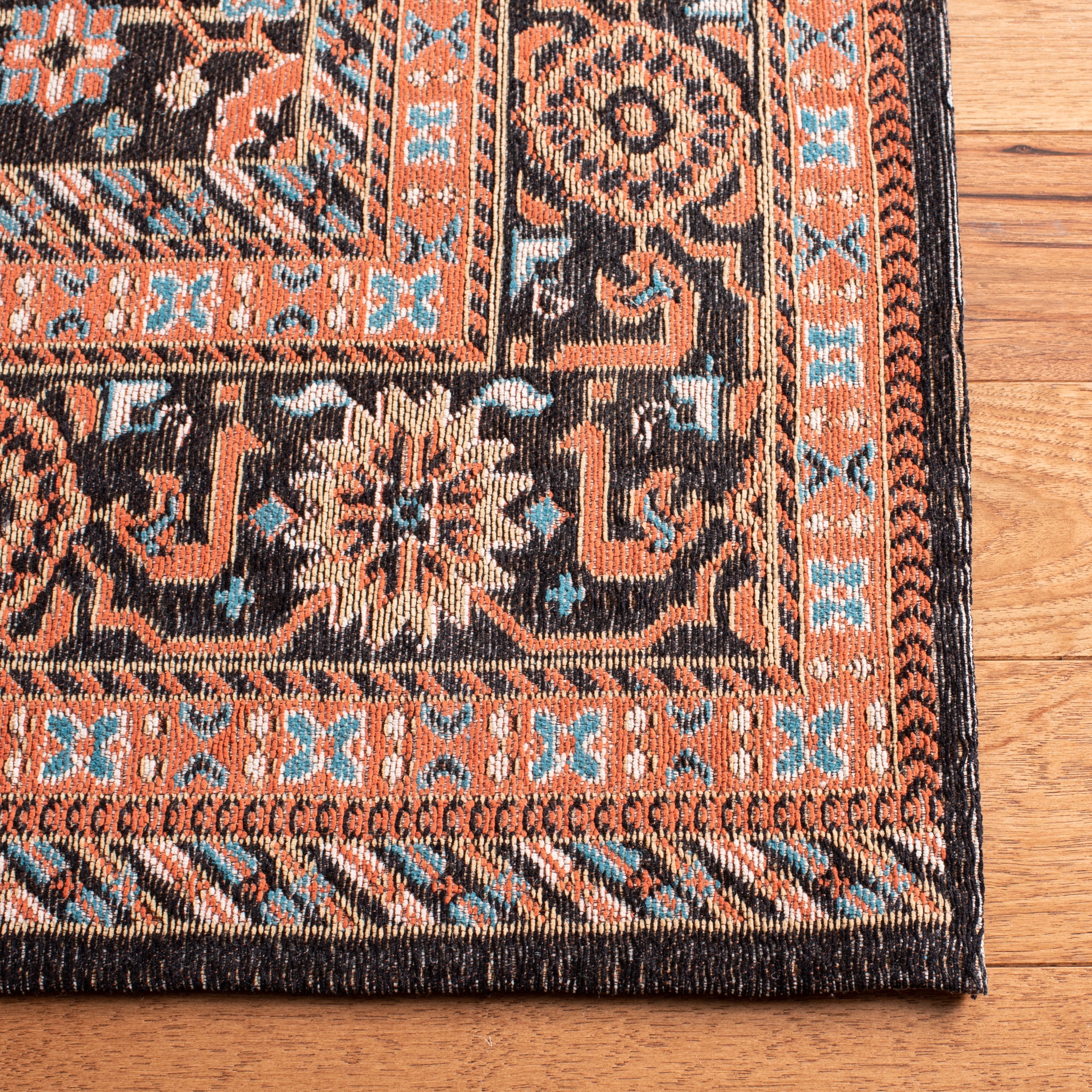 SAFAVIEH Classic Vintage Serrena Floral Bordered Polyester Runner Rug, Black/Rust, 2'3" x 8'