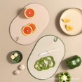 thumbnail image 3 of Chopping Board Set of 3 with Storage Stand, Food Grade Plastic Cutting Board Set with Garlic Grinding Area for Different Food Types(Orange), 3 of 8