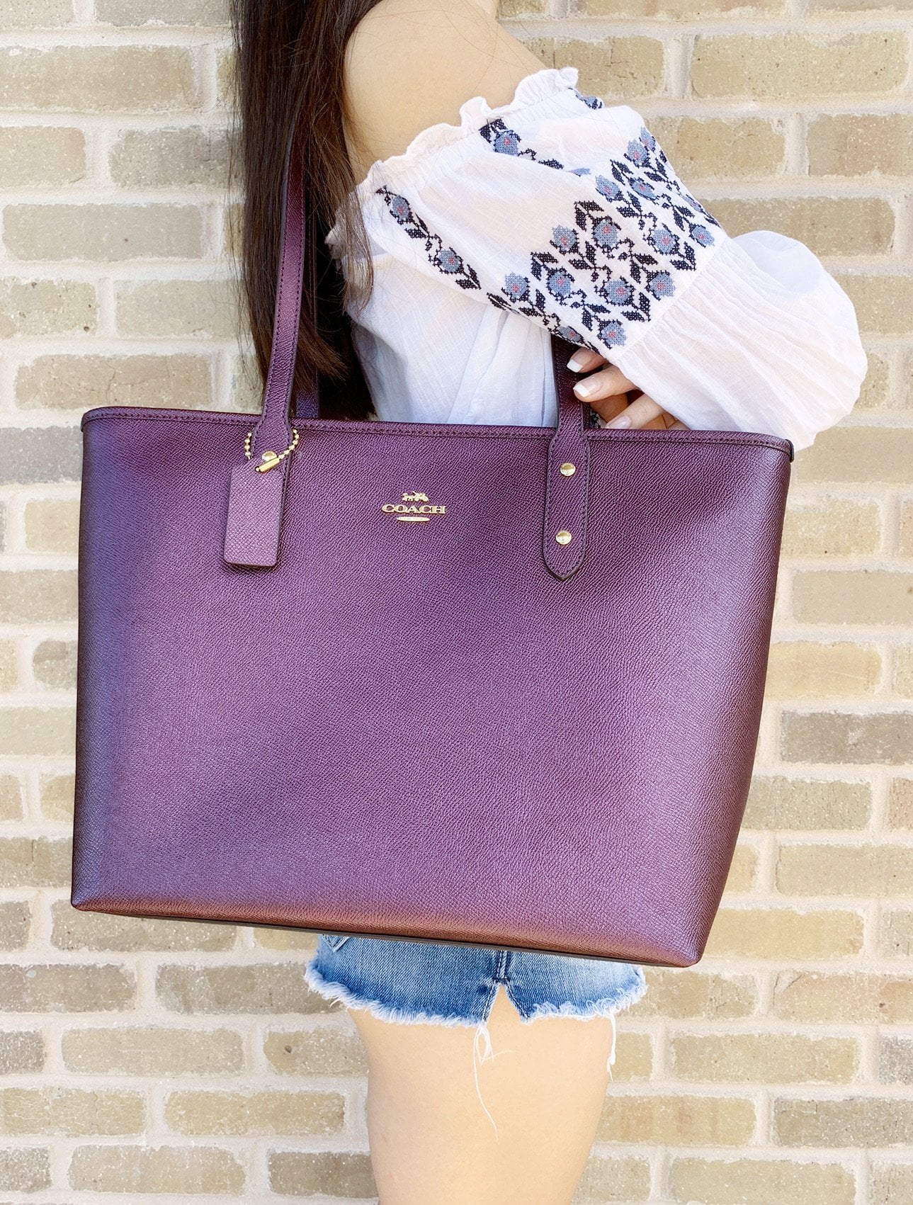 coach plum tote