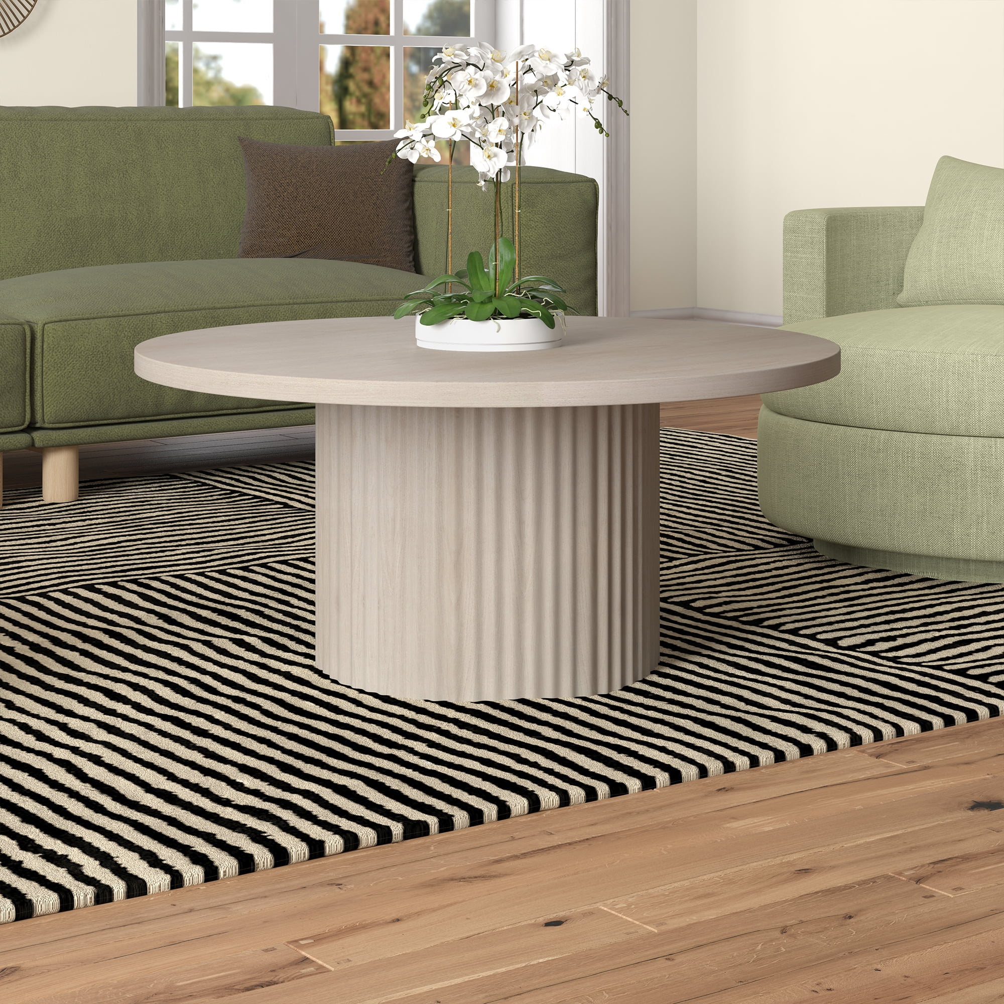 Rollan 32" Wide Round Fluted Coffee Table in Alder White