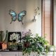 thumbnail image 5 of Arte de pared de mariposa de metal para exteriores, decoración de vallas de jardín, decoraciones colgantes de vidrio para patio o dormitorio, 5 of 5