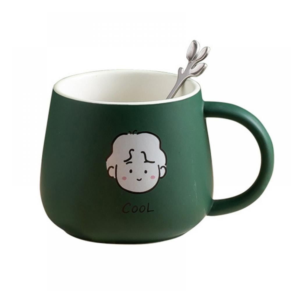 Handmade ceramic coffee or tea cup mug with unique design and round handle