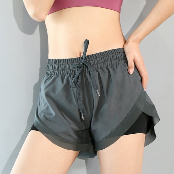 Short sport avec poche telephone best sale