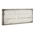thumbnail image 2 of Stupell Industries You're Home Now Weathered Shabby Chic Sign Canvas Wall Art, 30 x 13, Design by Daphne Polselli, 2 of 5