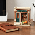thumbnail image 5 of Lighted Mini Bookstore Village House Figurine, Resin Autumn Fall Book Shop Miniature Building with LED Warm Lights Pumpkin Bench, Harvest Tabletop Decor Gift for Book Lovers, 5 of 7