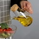 thumbnail image 4 of Aceitera de vidrio de borosilicato de 500 ml, hermética, con escala, apta para aceite, vinagre líquido y otros líquidos., 4 of 7