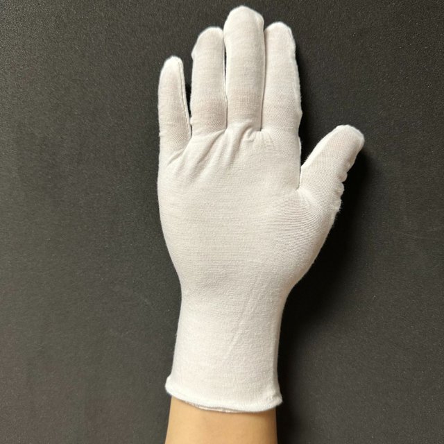 Guantes de algodón blanco algodón inspección de trabajo protección laboral etiqueta de trabajo texto guantes de juego